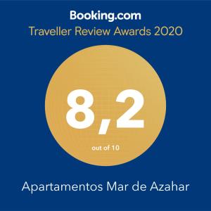 a yellow circle with the number eight and the number eightventh at Apartamentos Be Suites Mar de Azahar in Oropesa del Mar