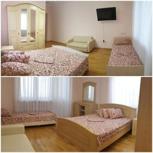 Una cama o camas en una habitación de Гостевой дом "PRESTIGE"