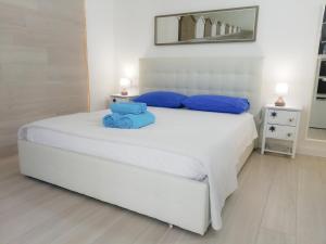 Postel nebo postele na pokoji v ubytování AlbaChiara B&B