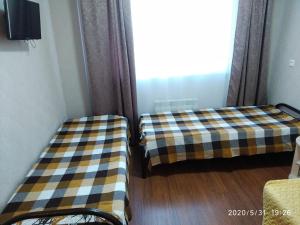 سرير أو أسرّة في غرفة في Apartment in Dzhemete