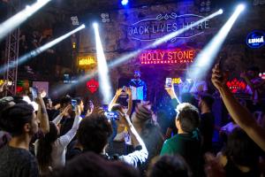 a crowd of people at a club with their hands in the air at Pera Boutique Hotel in Antalya