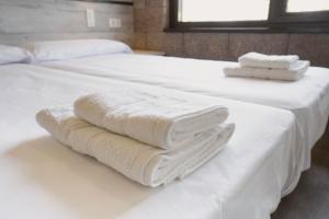 Postel nebo postele na pokoji v ubytování Casa Nahia Hostal Rural