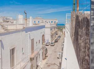 a view of a city street from a building at Chianca Bianca in Ostuni