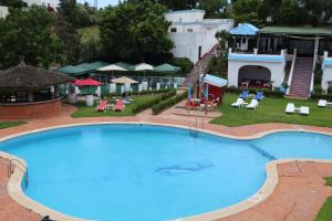 The swimming pool at or close to Hôtel Mandy