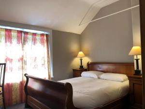 Postel nebo postele na pokoji v ubytování Harveys Guest House