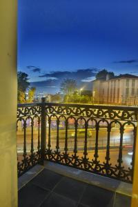 a black fence with a view of a street at Galata Dream Hotel in Istanbul