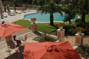 Бассейн в Relais Villa San Martino или поблизости