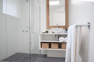 a bathroom with a sink and a shower at Anchor Geelong in Geelong