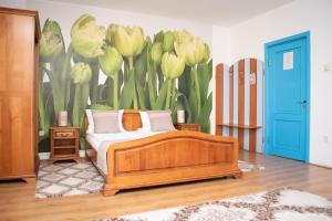 A bed or beds in a room at Motel Via Targu Mures