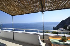 
A balcony or terrace at Positano Villa Sleeps 4 Air Con WiFi
