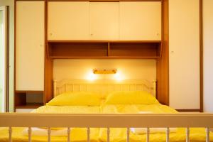 Кровать или кровати в номере Apartements Magdalena