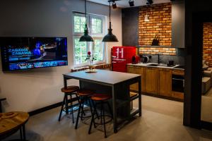 Kuchyňa alebo kuchynka v ubytovaní Apartament Piastowska No.6