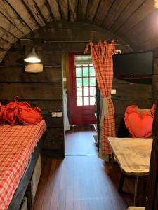Postel nebo postele na pokoji v ubytování Gîte insolite "Le Coup de Foudre" Sa Vue Panoramique