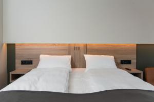 Postel nebo postele na pokoji v ubytování Thon Partner Hotel Norge