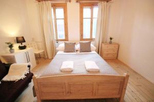 Posteľ alebo postele v izbe v ubytovaní Apartament BazaTatry Taternicki