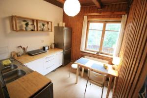Kuchyňa alebo kuchynka v ubytovaní Apartament BazaTatry Taternicki