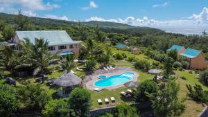 an aerial view of a resort with a swimming pool at La Belle Rodriguaise in Rodrigues Island
