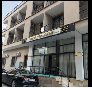 a car parked in front of a building at Hotel Sultansaray Sultanhanı in Sultanhanı