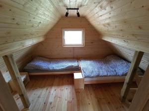 Postel nebo postele na pokoji v ubytování Agroturystyka Skoszewo