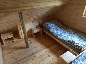 Postel nebo postele na pokoji v ubytování Agroturystyka Skoszewo