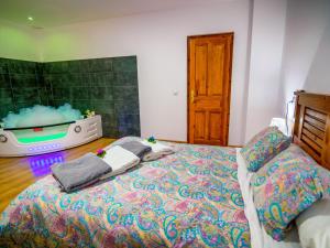 A bed or beds in a room at Chalet in La Omañuela near Ski Resort