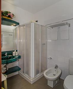 Koupelna v ubytování Hotel Rex