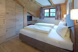 Krevet ili kreveti u jedinici u okviru objekta Hotel Gasthof Obermair