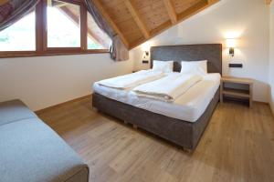 Krevet ili kreveti u jedinici u okviru objekta Hotel Gasthof Obermair