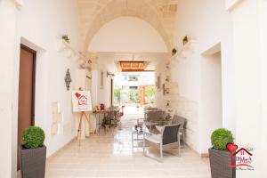 A seating area at La DIMorA di Marco - Exclusive Art Rooms Salento