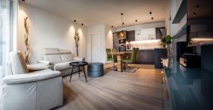 Posezení v ubytování Appartements Parkgasse by Schladming-Appartements