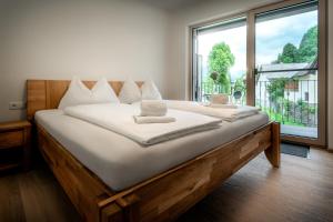 Posteľ alebo postele v izbe v ubytovaní Appartements Parkgasse by Schladming-Appartements