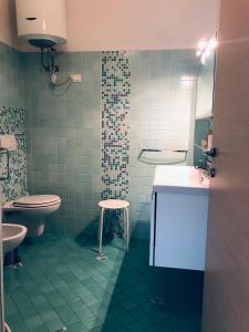 Et badeværelse på Appartamenti Venere + 103 billeder