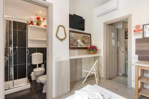 Vonios kambarys apgyvendinimo įstaigoje Guest House Biffi Simone
