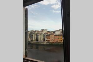Nespecifikovaný výhled na destinaci Florencie nebo výhled na město při pohledu z apartmánu