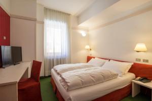 En eller flere senge i et værelse på Antico Albergo Stella d'Italia