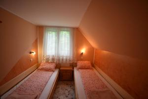 A bed or beds in a room at Apartment Vihor