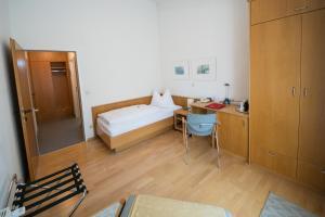 Postel nebo postele na pokoji v ubytování Am Spiegeln dialog.hotel.wien + 19 fotografií