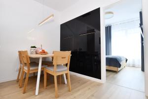 Posedenie v ubytovaní Apartamenty NAVIGATOR PORT-NADMORSKIE TARASY Brilliant 613