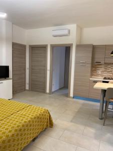 Televízia a/alebo spoločenská miestnosť v ubytovaní Casa sul mare