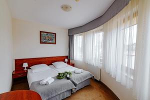 Postel nebo postele na pokoji v ubytování Panorama_SPA
