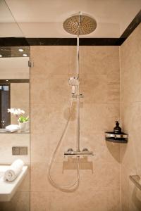Ванная комната в Gold Palais Hotel