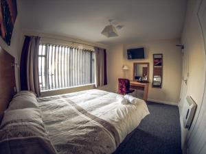 Cama o camas de una habitación en Hallam Rooms