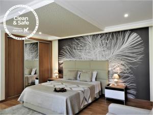 Postel nebo postele na pokoji v ubytování Hotel Rural Rocha da Gralheira
