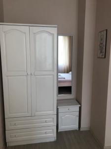 Postel nebo postele na pokoji v ubytování Guest rooms Luxor