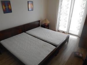 Ліжко або ліжка в номері Apartmány KOTVA