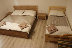 Postel nebo postele na pokoji v ubytování Apartmány u Beka