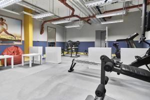 Posilňovňa alebo fitness centrum v ubytovaní Exclusive Apartments Marina by Noclegi Renters