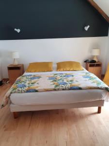 Postel nebo postele na pokoji v ubytování Hôtel - Restaurant l'Hortensia