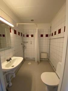 Ванна кімната в Broby Gästgivaregård