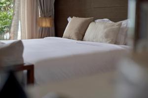 Ein Bett oder Betten in einem Zimmer der Unterkunft Chula Beach Resort